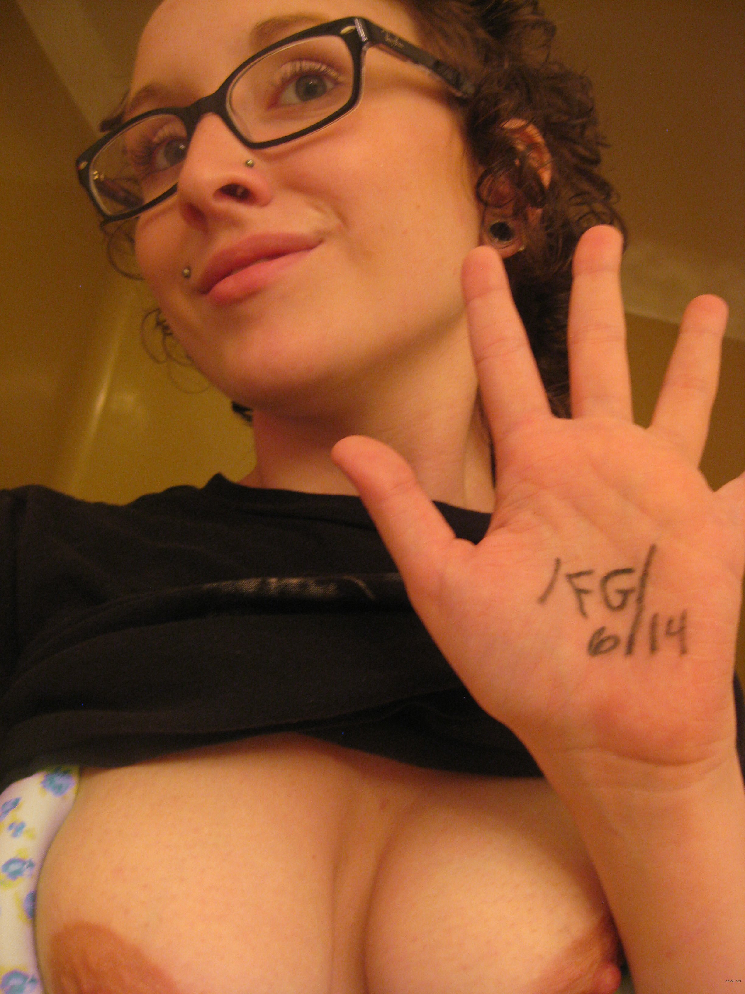 Explicit Bald Pussy Amateur Porn: Hot Wet Woman's Explicit Close-Up Photo