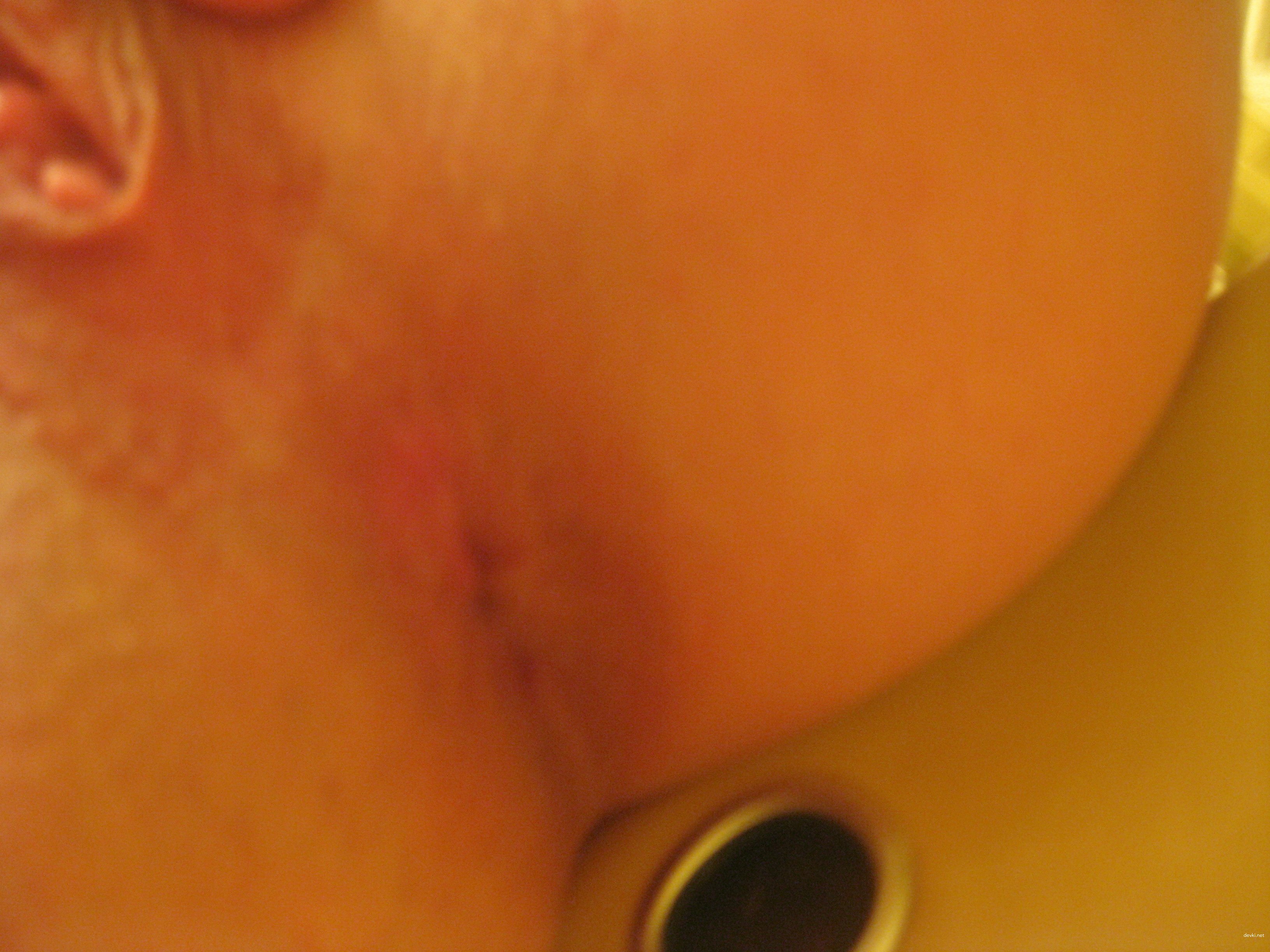 Explicit Bald Pussy Amateur Porn: Hot Wet Woman's Explicit Close-Up Photo