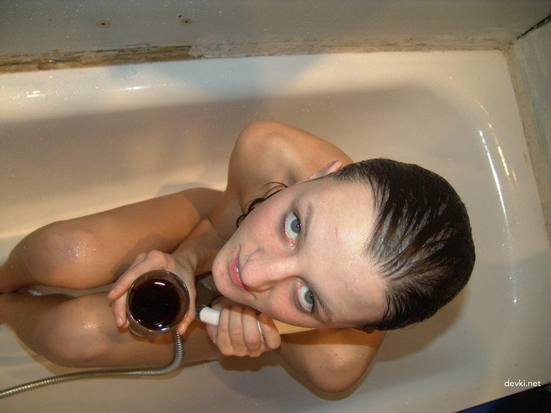 Explicit Amateur Slut Shows Off Shaved Pussy in Personal XXX Pics