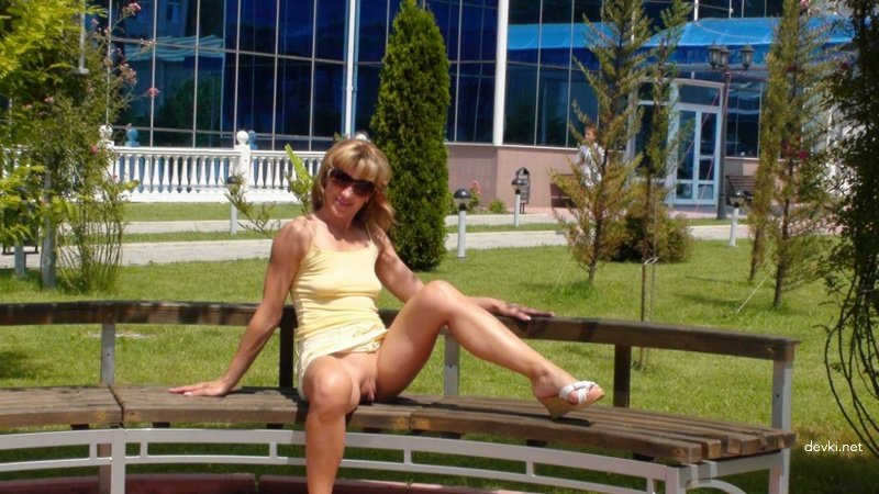 Outdoor Pissing: Amateur Woman Urinating on Road - Explicit Public Porn Pic