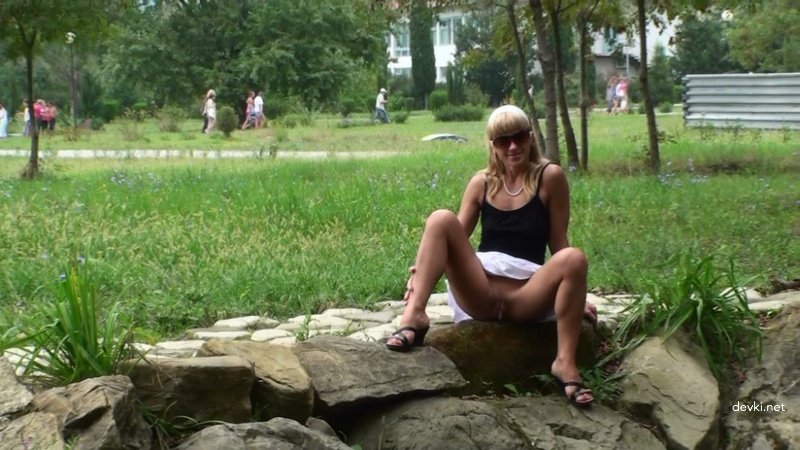 Outdoor Pissing: Amateur Woman Urinating on Road - Explicit Public Porn Pic