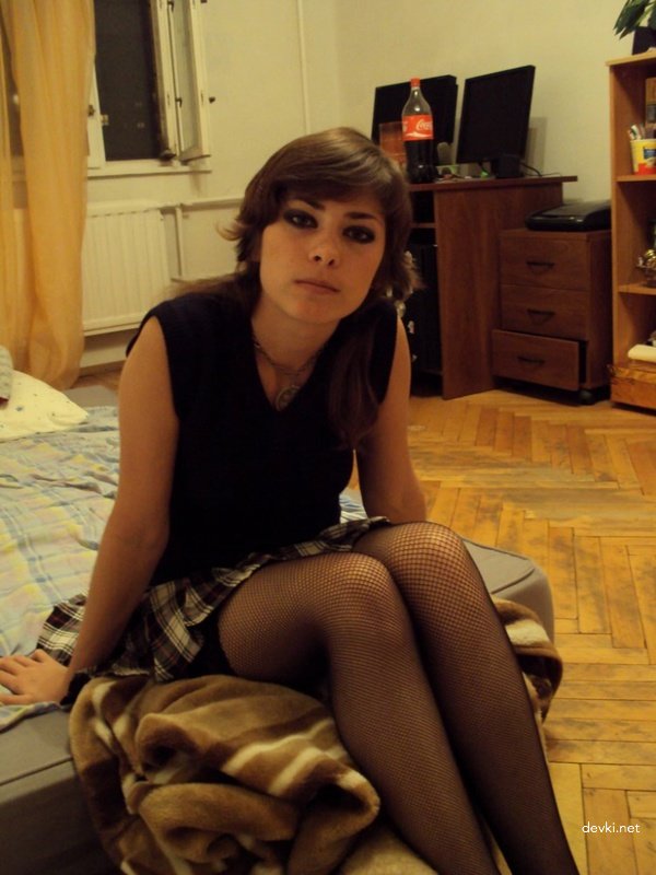 Sexy Young Girl in Stockings - Explicit Amateur Photo of Hot Babe Showing Off Legs and Lingerie