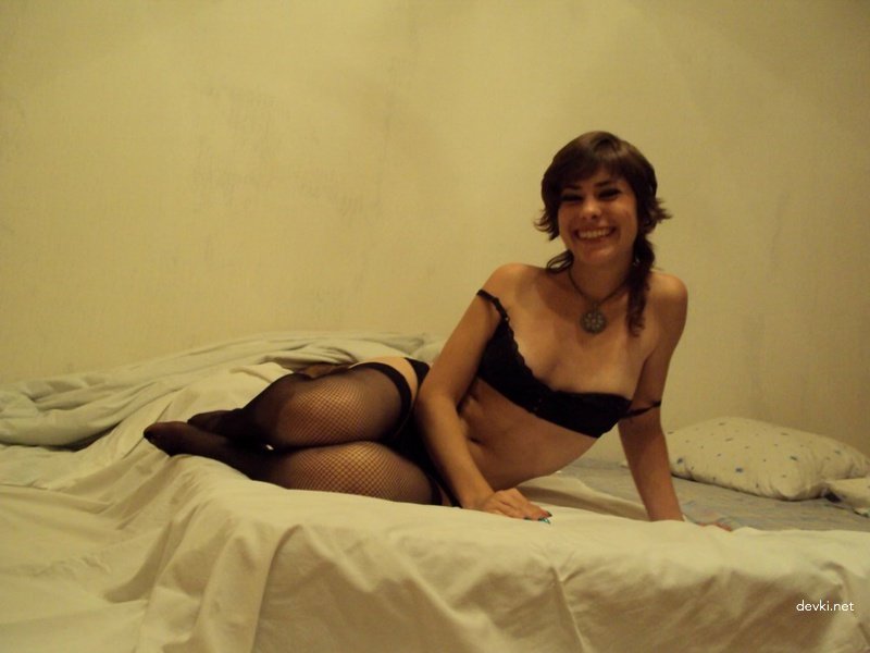 Sexy Young Girl in Stockings - Explicit Amateur Photo of Hot Babe Showing Off Legs and Lingerie
