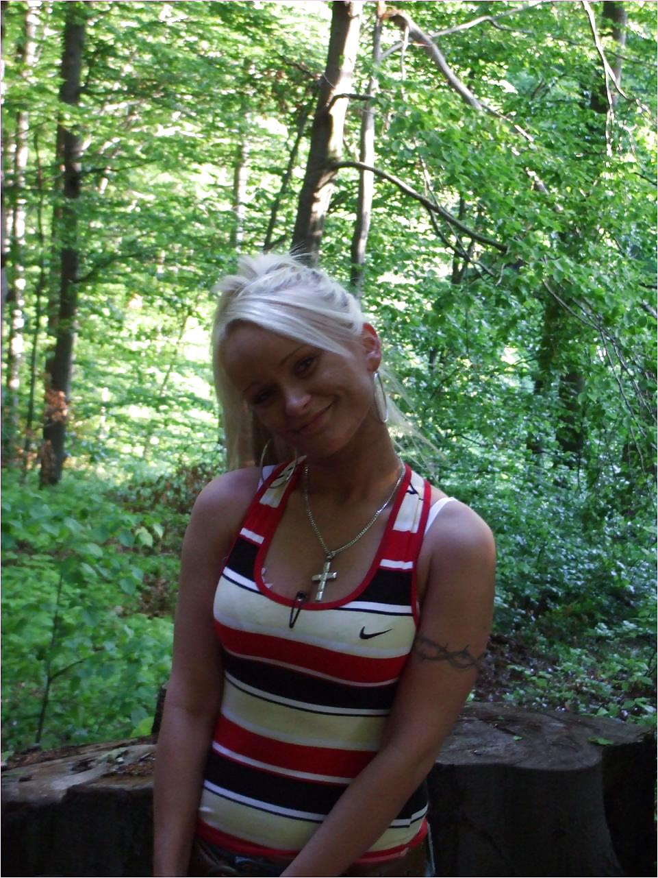 Blonde Bombshell Bares All: Explicit Nude Photoshoot