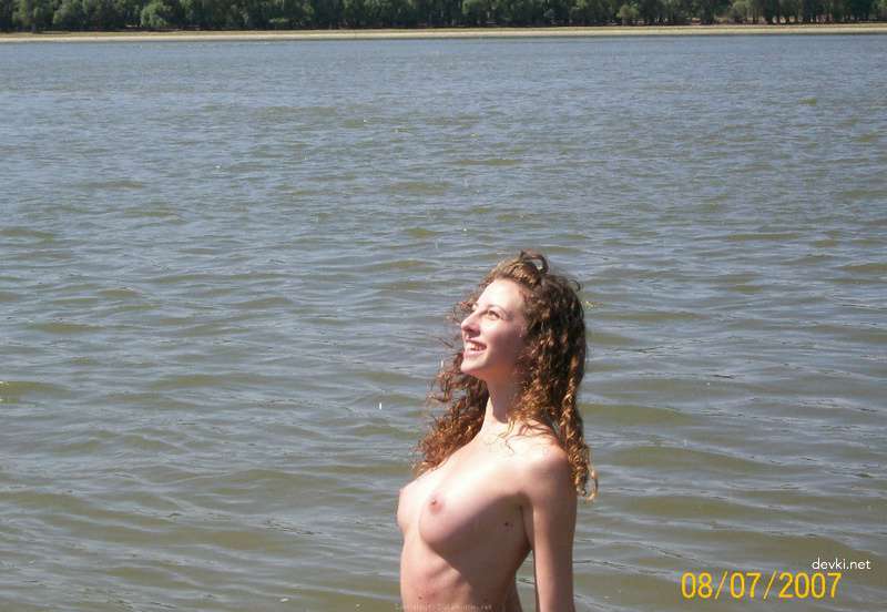 Topless Beach Babe: Explicit Amateur Sea Bathing Photo