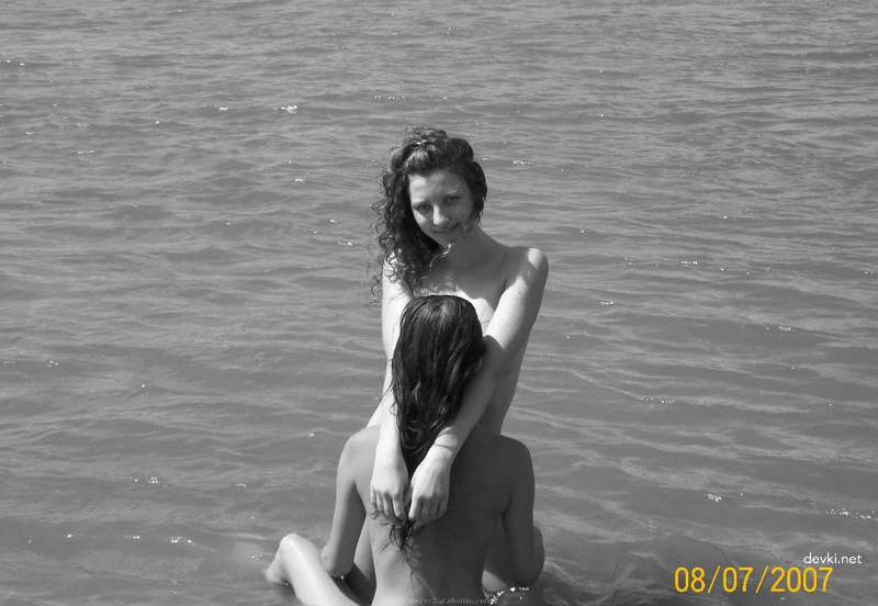Topless Beach Babe: Explicit Amateur Sea Bathing Photo