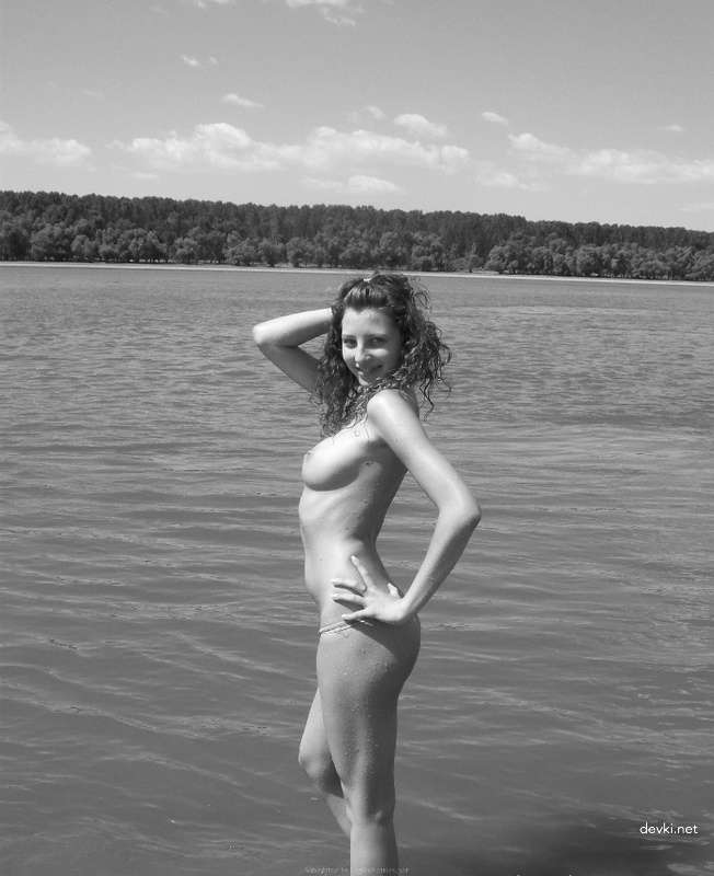 Topless Beach Babe: Explicit Amateur Sea Bathing Photo