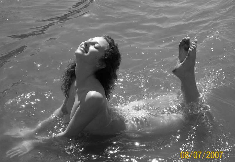 Topless Beach Babe: Explicit Amateur Sea Bathing Photo