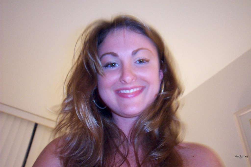 Amateur Wife's Erotic Cock-Biting Action in Homemade Sex Tape - Explicit XXX Photo