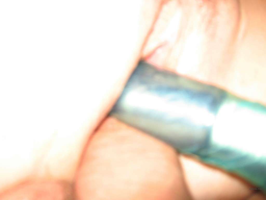 Amateur Wife's Erotic Cock-Biting Action in Homemade Sex Tape - Explicit XXX Photo