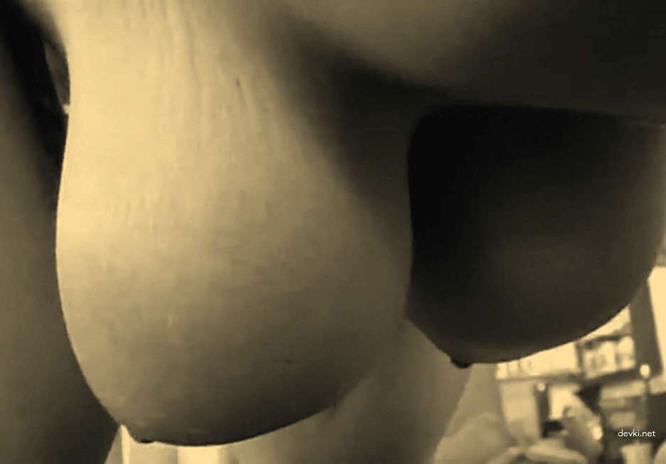 Amateur Big-Titted Babe Rides Trainer's Cock in Explicit Porn Shoot