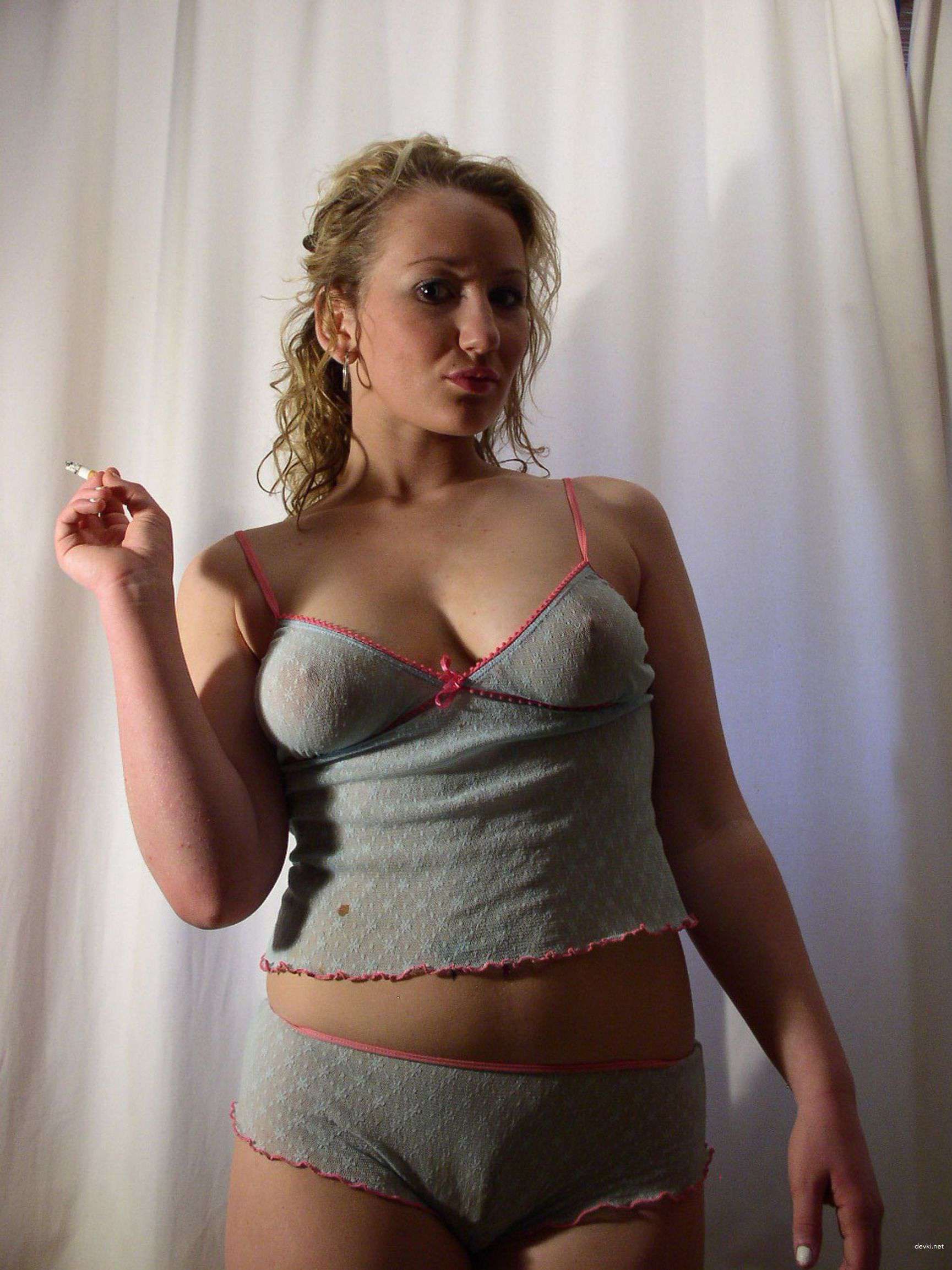 Amateur Nude Woman Poses Explicitly in Private Photo Shoot