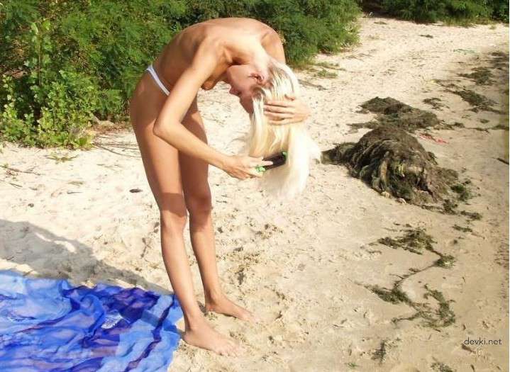 Blonde Nude Sunbathing: Explicit Amateur Photo for Adults Only