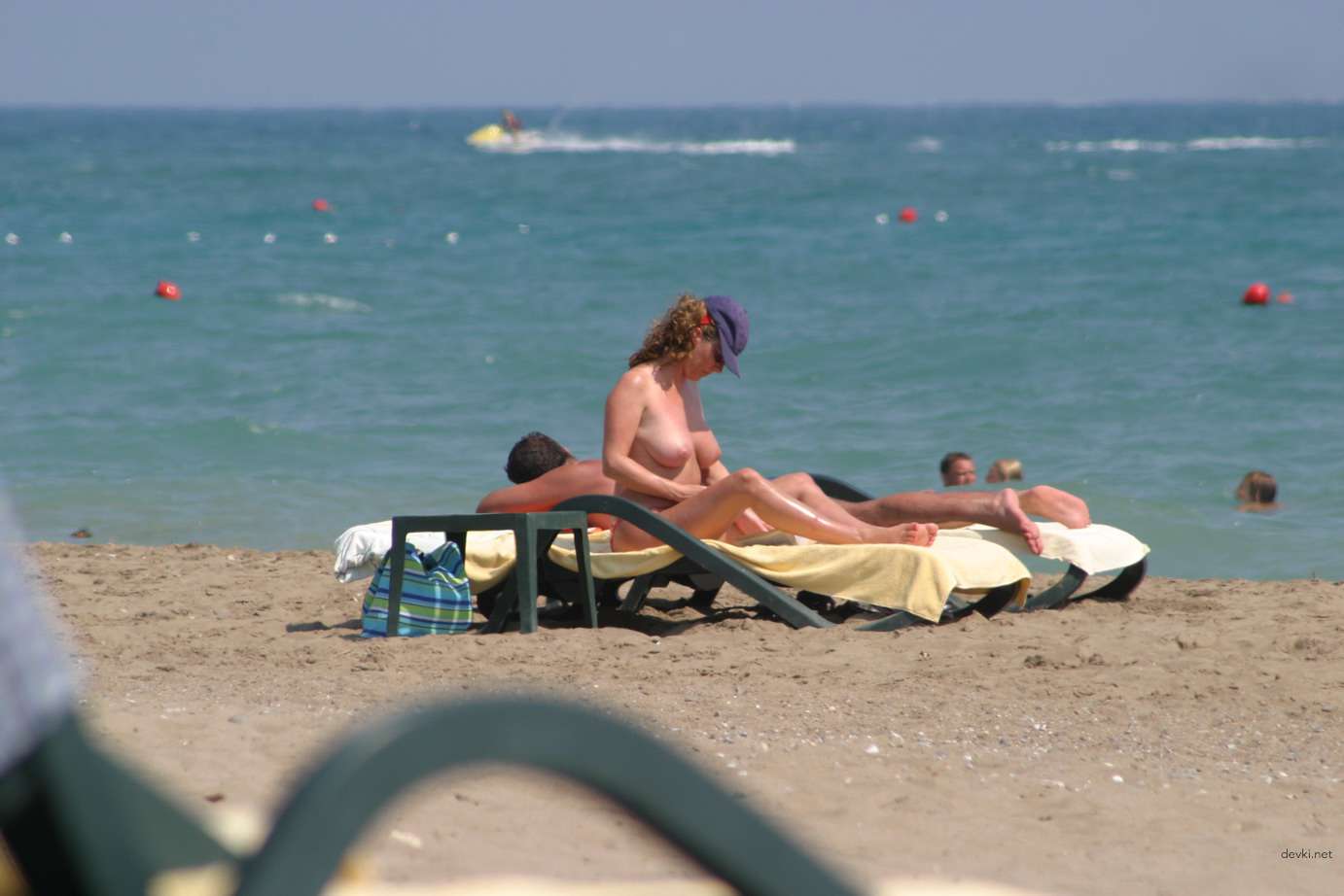 Explicit Topless Beach Babes: Amateur Nudes for Adults