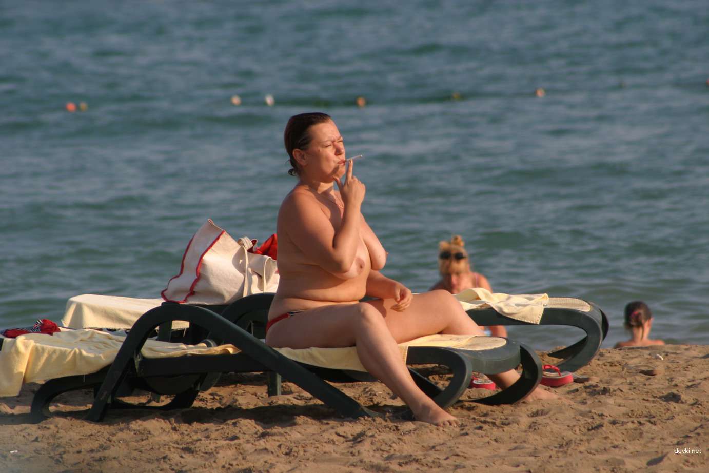 Explicit Topless Beach Babes: Amateur Nudes for Adults