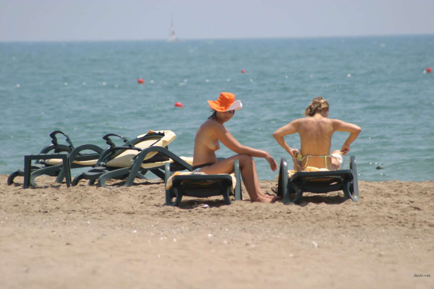 Explicit Topless Beach Babes: Amateur Nudes for Adults