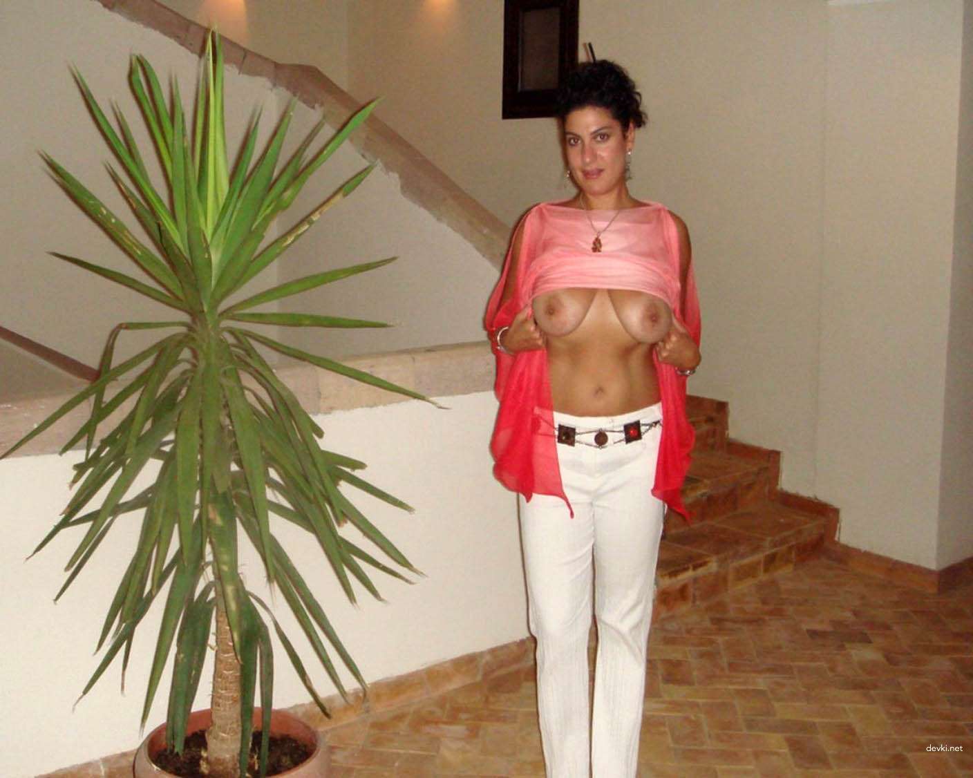 Seductive Amateur Woman Flaunts Busty Assets - Uncensored Photo