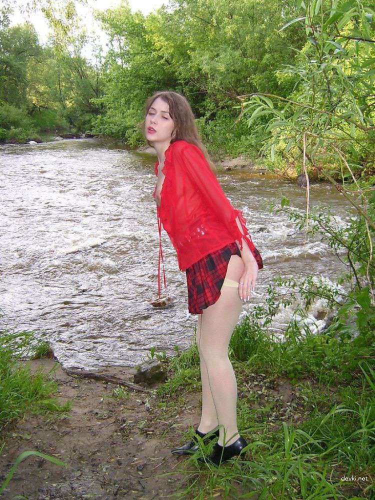 Amateur Nude Woman Bares All by River: Explicit Naked Pose Photo