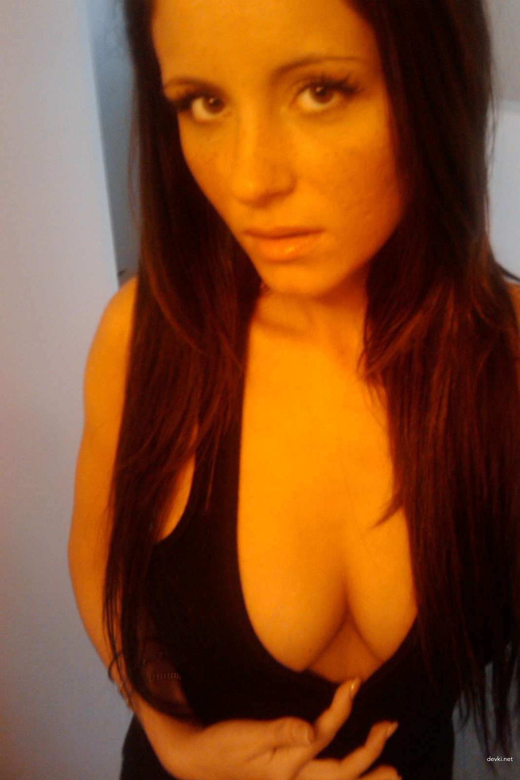 Sultry Brunette in Stockings: Amateur Beauty Exposed in Hot Photoshoot!