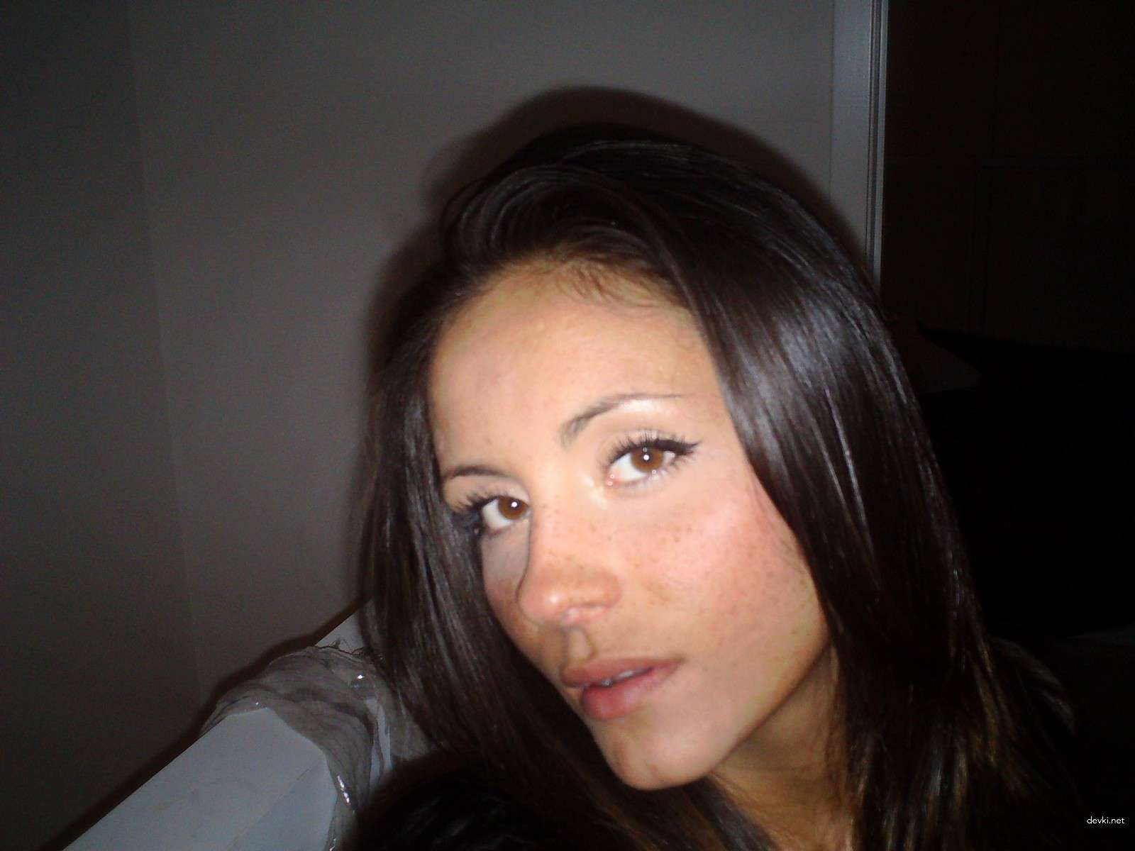 Sultry Brunette in Stockings: Amateur Beauty Exposed in Hot Photoshoot!