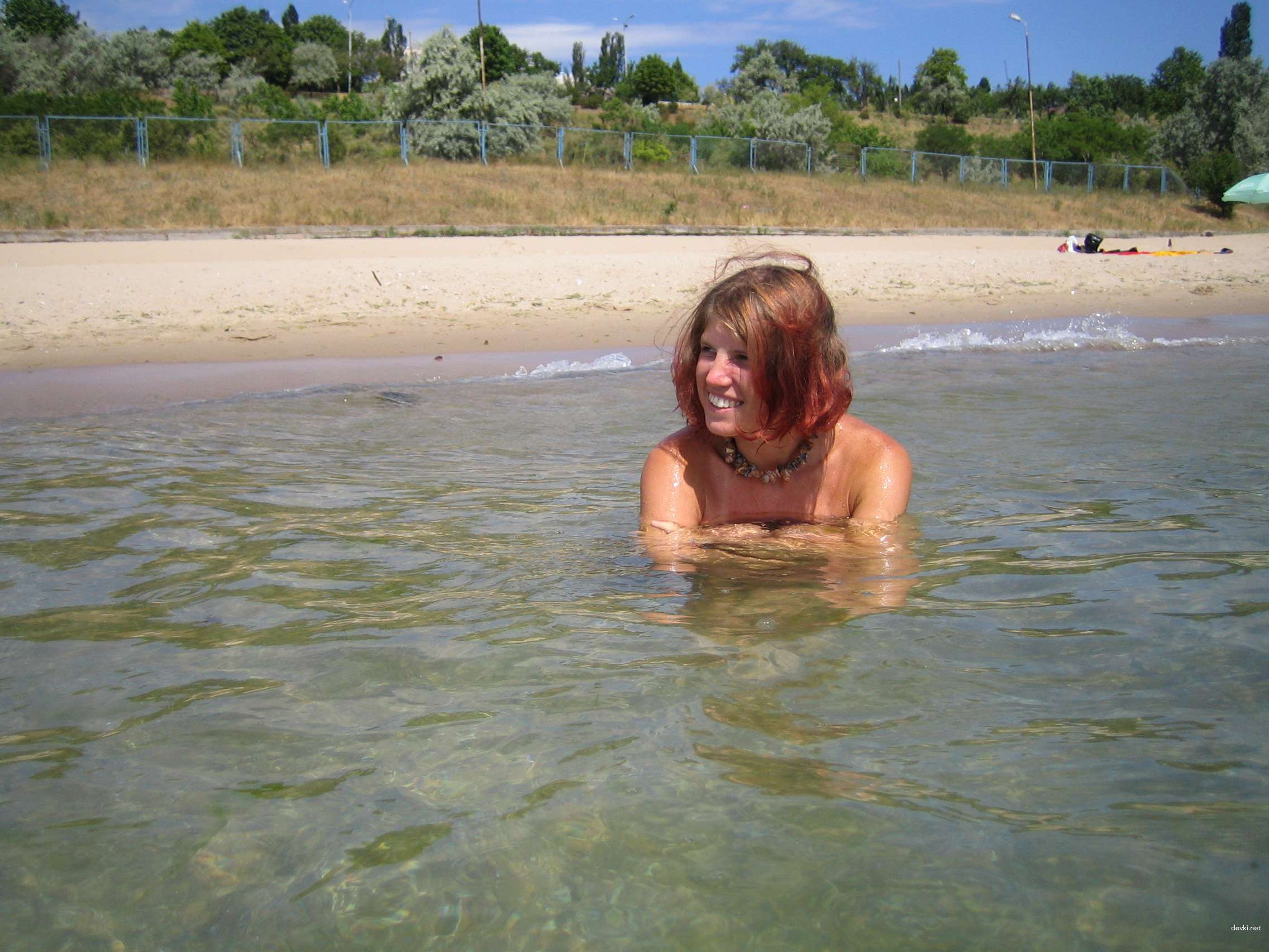 Topless Blonde Amateur Lounging - Explicit Photo Shoot