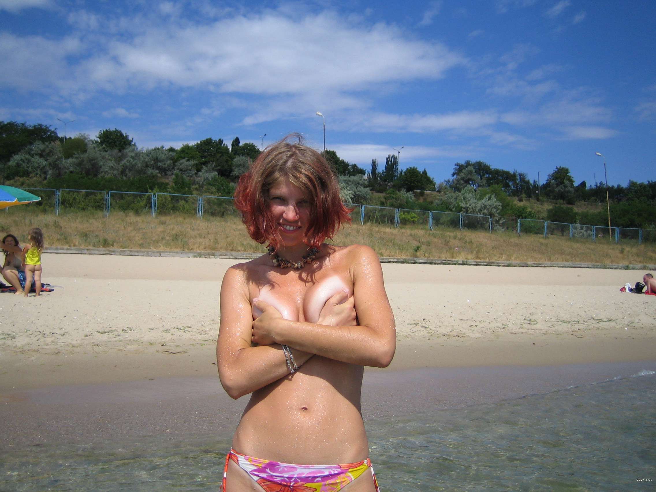 Topless Blonde Amateur Lounging - Explicit Photo Shoot