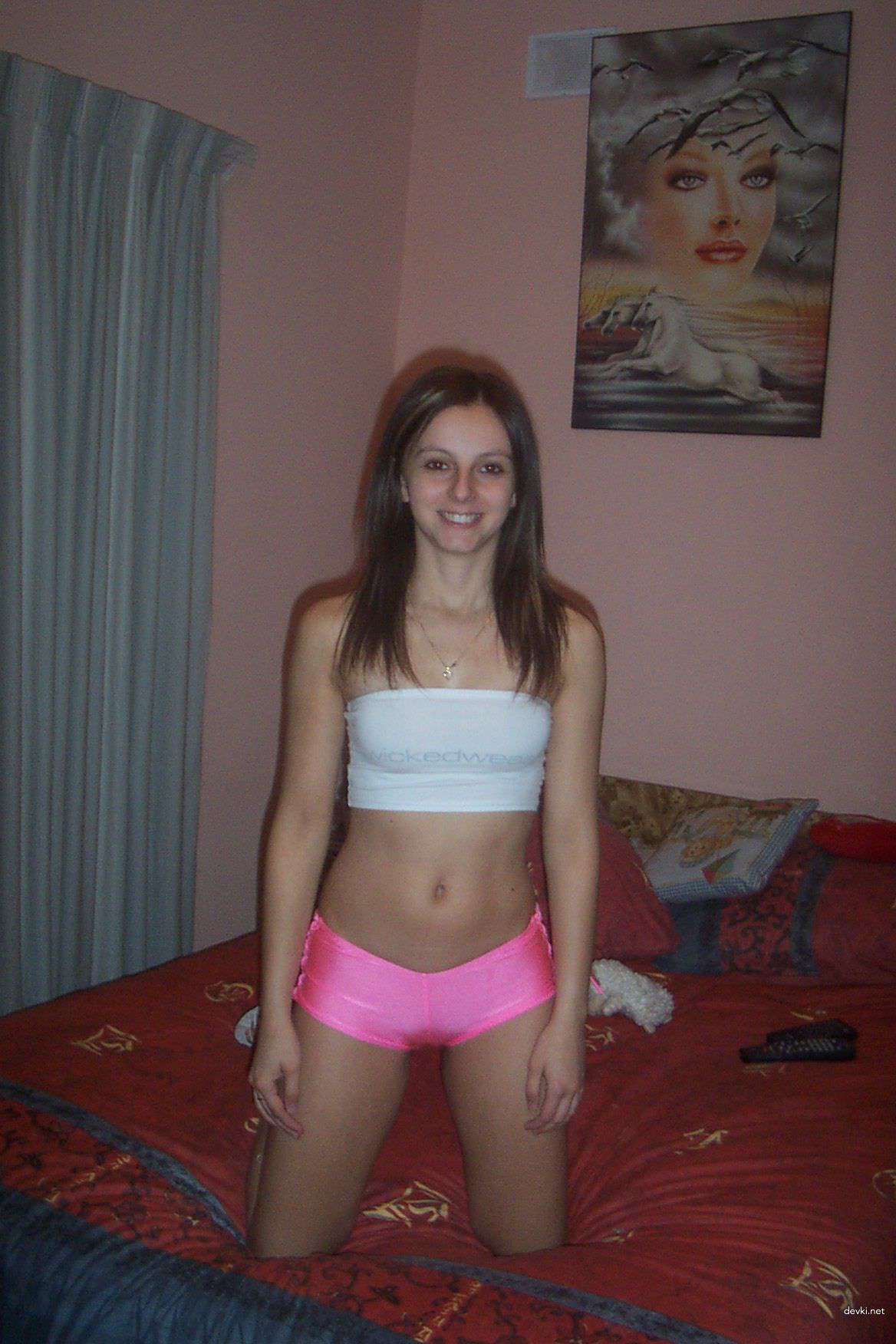 Explicit Nude Model Poses Seductively in Amateur Photo Shoot