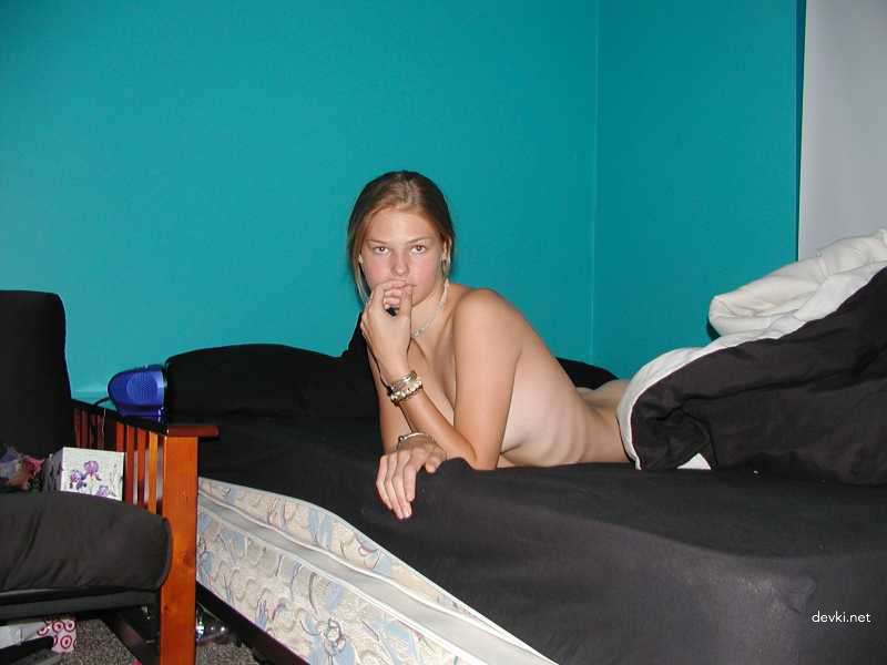 Explicit Nude Photoshoot: Amateur Girl Poses in Erotic Content