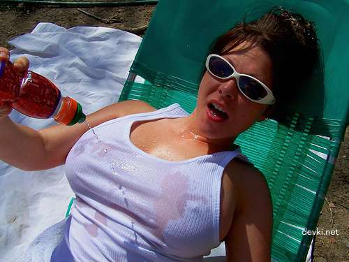 Busty Amateur Seductively Poses in Sensual Erotica Photoshoot
