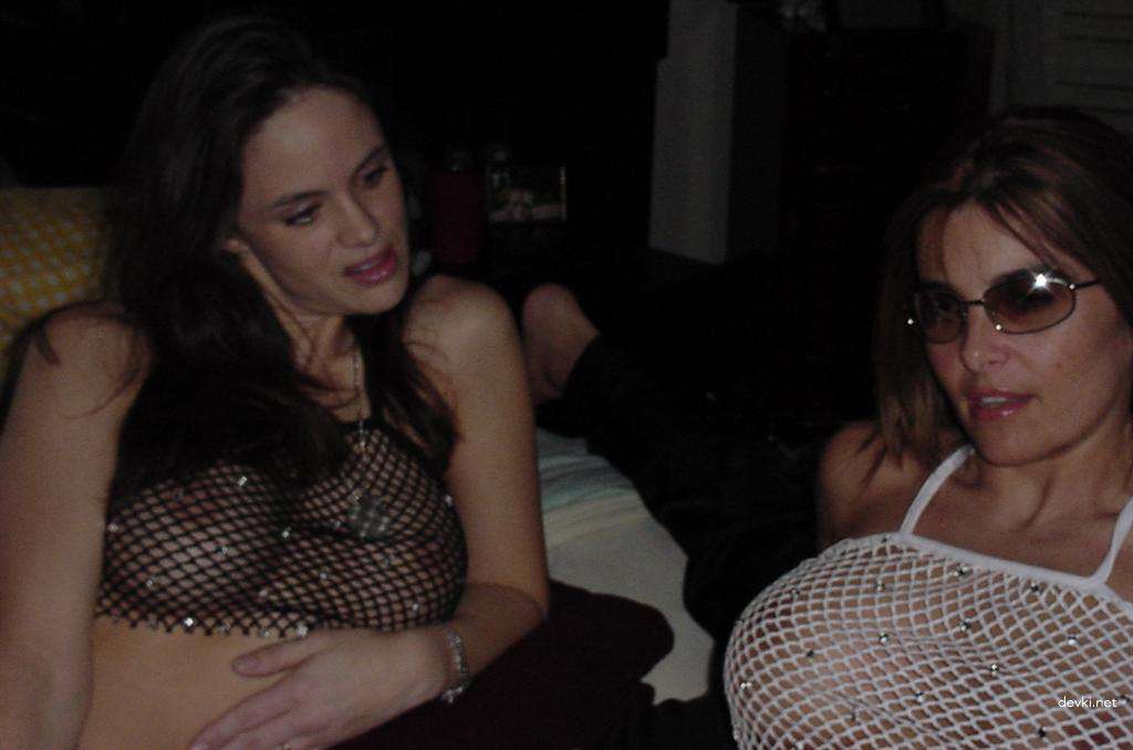 Amateur Porn Pics: Busty Babe with Fake Tits Gets Naughty in Explicit XXX Photos