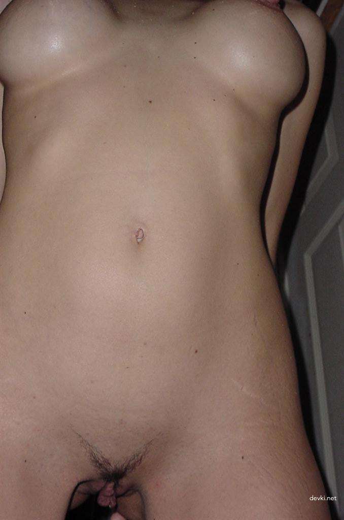 Amateur Porn Pics: Busty Babe with Fake Tits Gets Naughty in Explicit XXX Photos