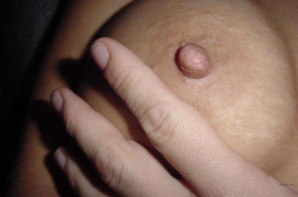 Amateur Porn Pics: Busty Babe with Fake Tits Gets Naughty in Explicit XXX Photos