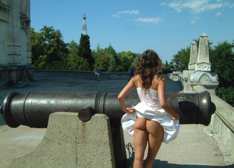 Explicit Amateur Stripper Show: Public Girl Striptease Photo