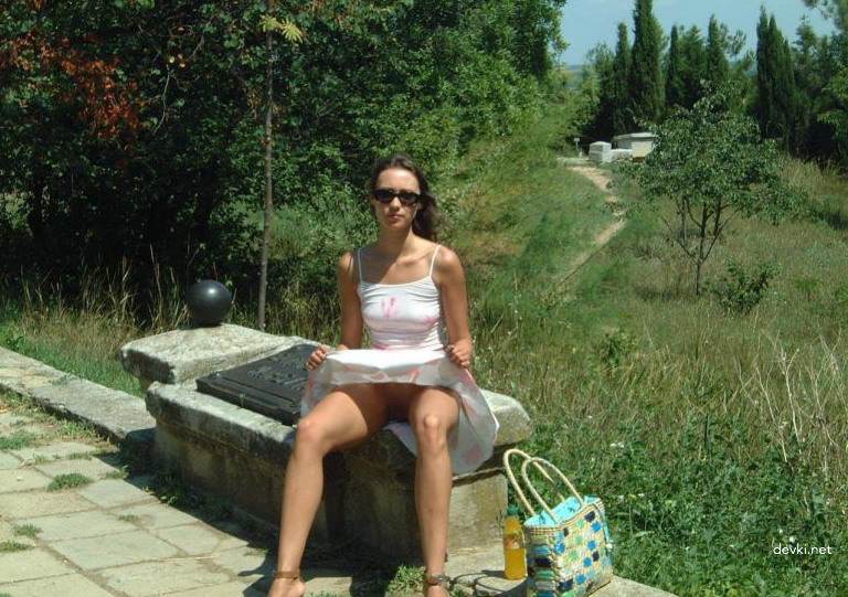 Explicit Amateur Stripper Show: Public Girl Striptease Photo