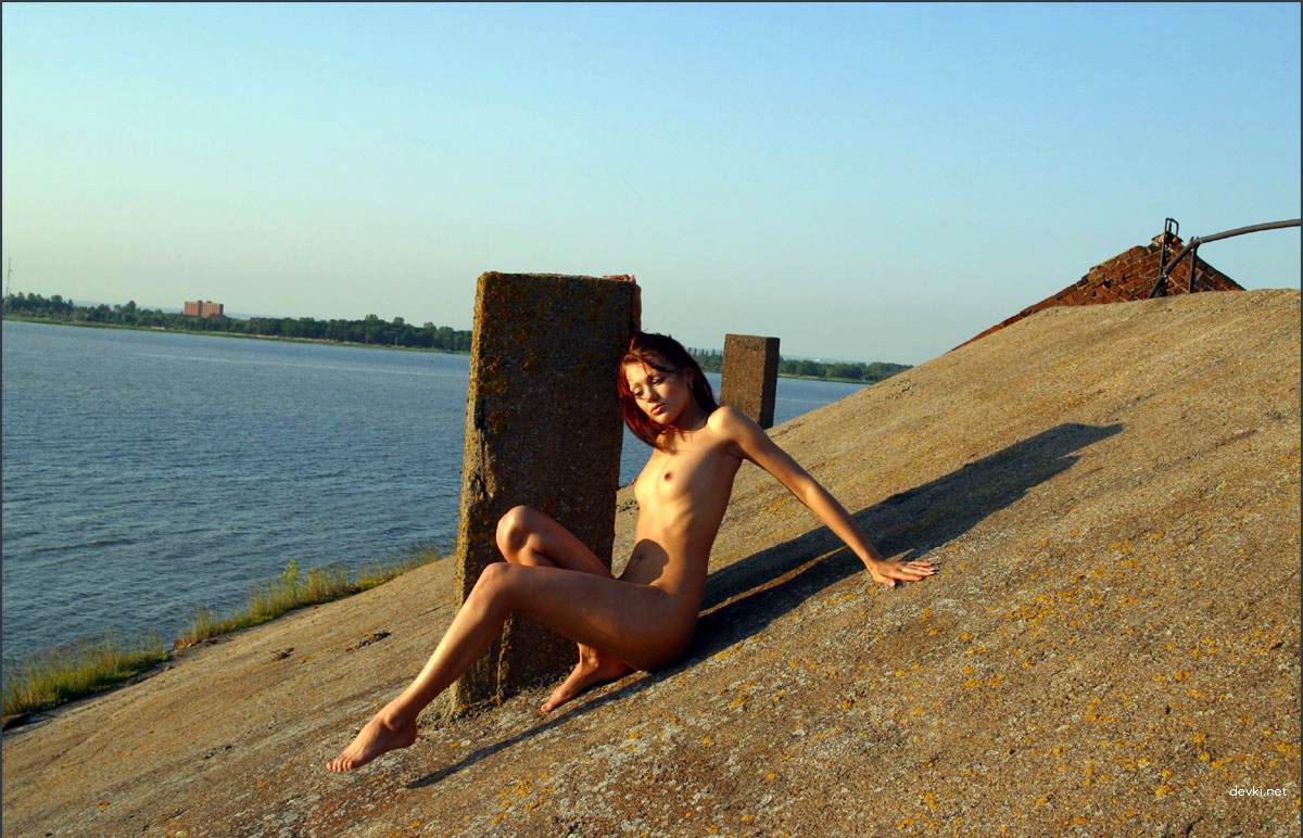 Sizzling Redhead Exposes Perky Boobs on Rooftop - XXX Amateur Pic