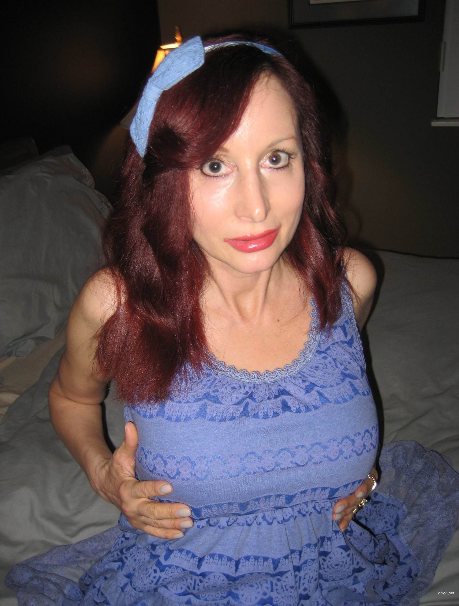 Hot MILF with Fake Tits: Uncensored Amateur Pic Revealed
