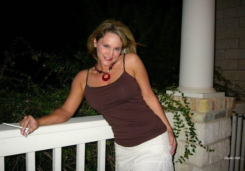 Naughty Mature Lady Flaunts Her Assets on Balcony - Explicit Amateur Photo
