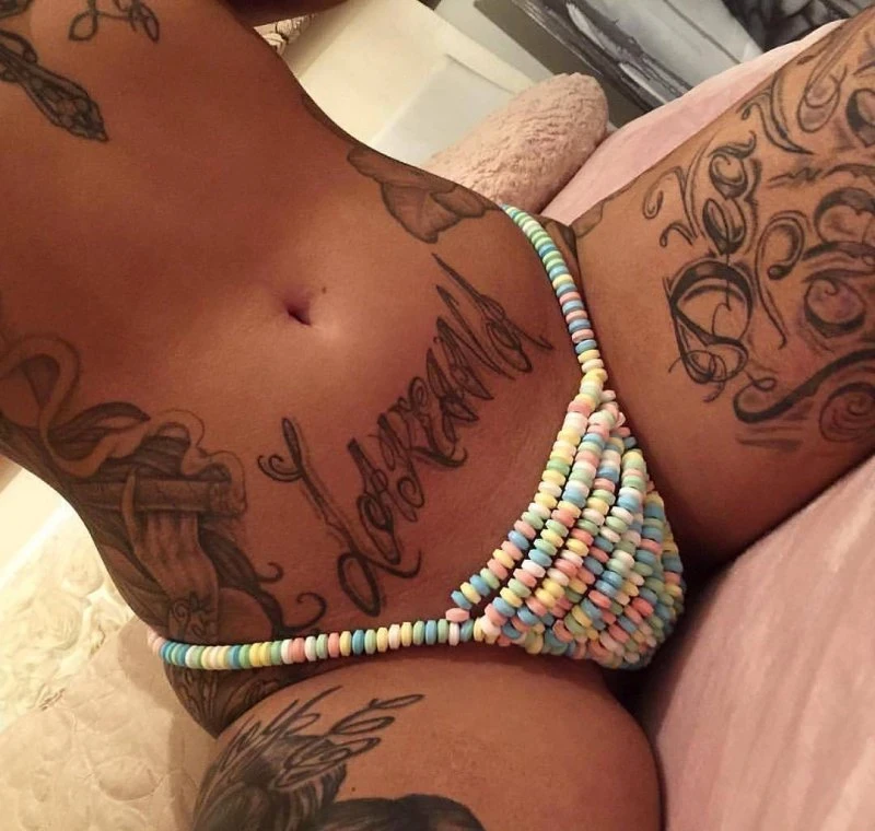 Sexy Tattooed Vixens: Explicit Curves and Inked Bodies